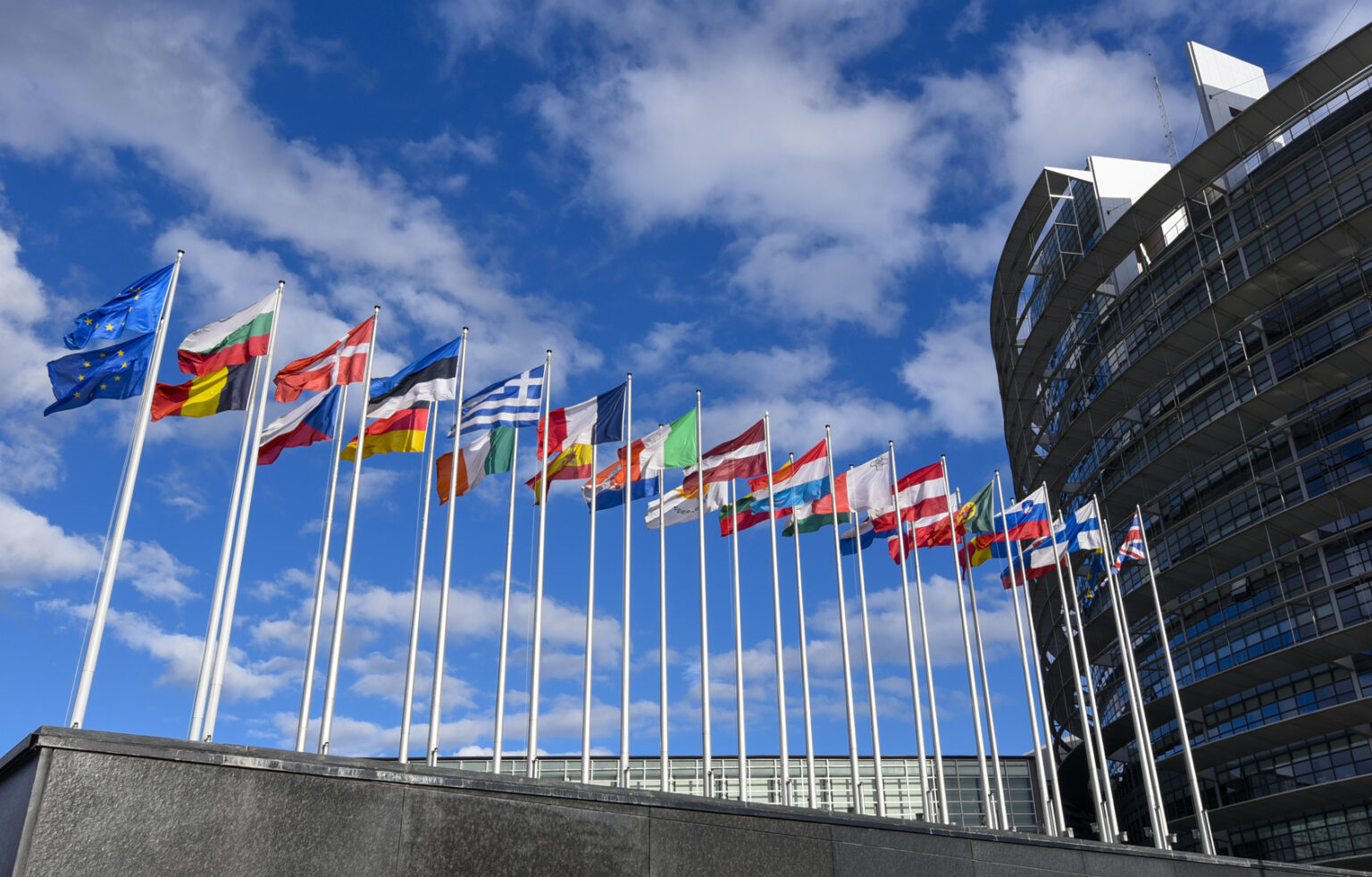 EU Russian Diamond Import Ban Draws Nearer stockshots of flags in front of ep building